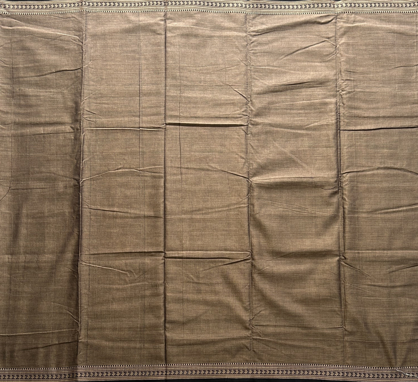 Narayanpet Cotton Saree Stone Colored Complemented with a Thread Border.