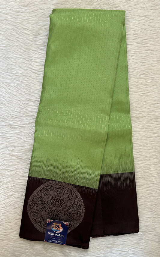 Kanjivaram Festive Silk Saree Parrot Green colored Saree complemented with a Brown Colored Plain Border with Motif Weaving. - Sampradaya Designer Studio