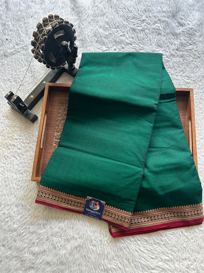 Narayanpet Cotton Saree Forest Green Colored Complemented with a Thread Border.