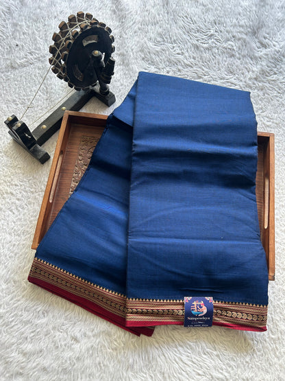 Narayanpet Cotton Saree Prussian Blue Colored Complemented with a Thread Border.