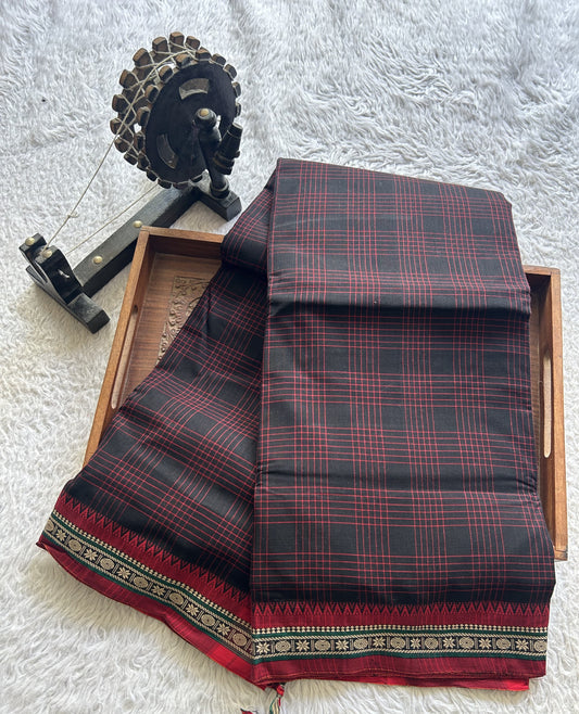 Narayanpet Cotton Checks Saree Jek Black Colored Complemented with a Thread Border.