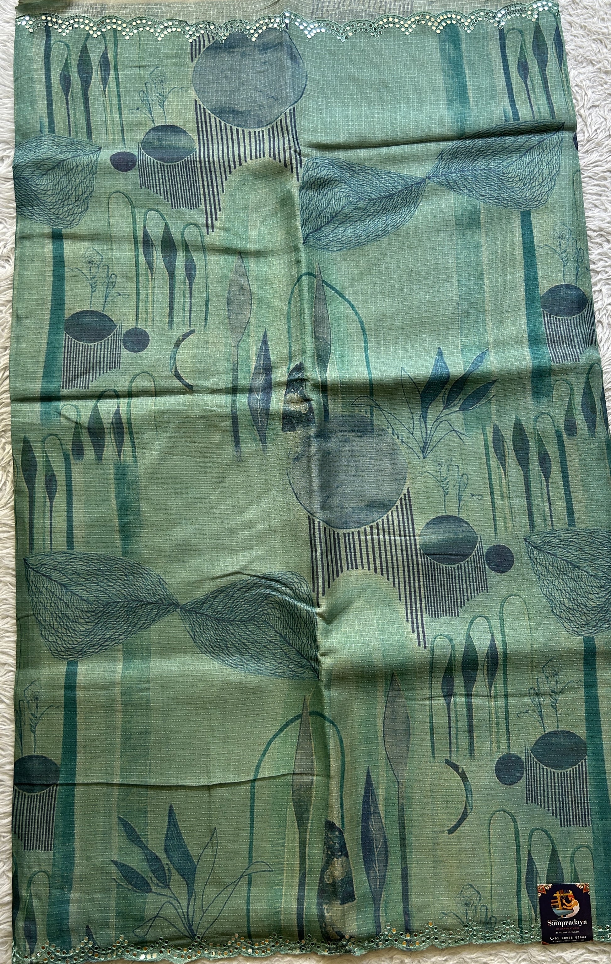 Semi Tussar Saree Aqua Green Colored Elegantly Paired with a Mirror Work Border. - Sampradaya Designer Studio