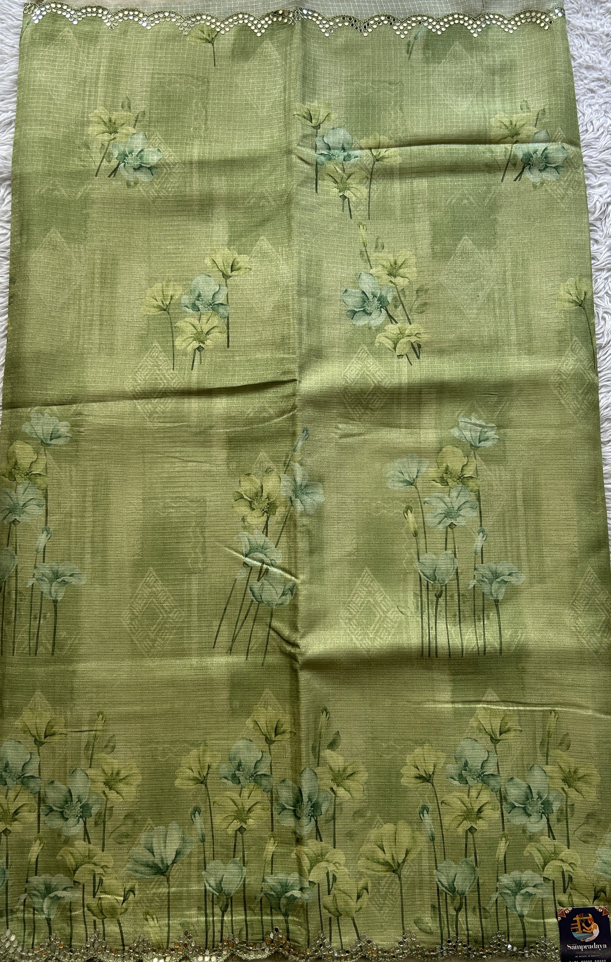 Semi Tussar Saree Parrot Green Colored Elegantly Paired with a Mirror Work Border. - Sampradaya Designer Studio