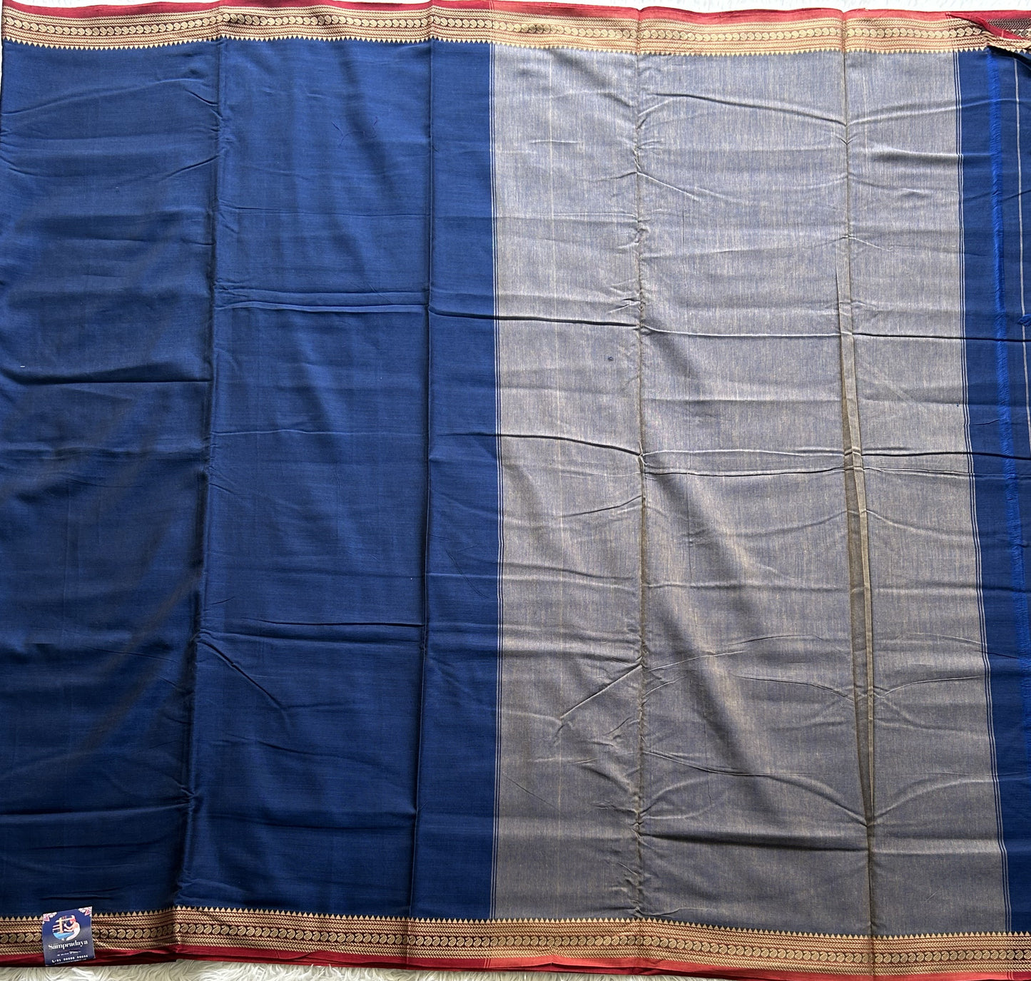 Narayanpet Cotton Saree Prussian Blue Colored Complemented with a Thread Border.