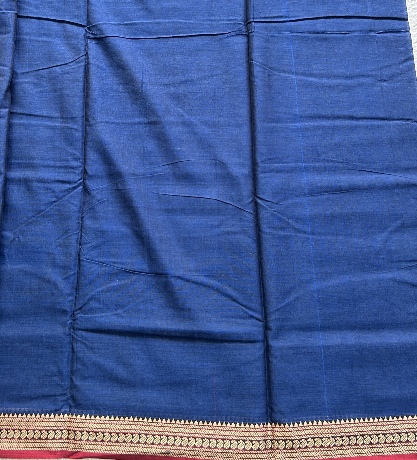 Narayanpet Cotton Saree Prussian Blue Colored Complemented with a Thread Border.