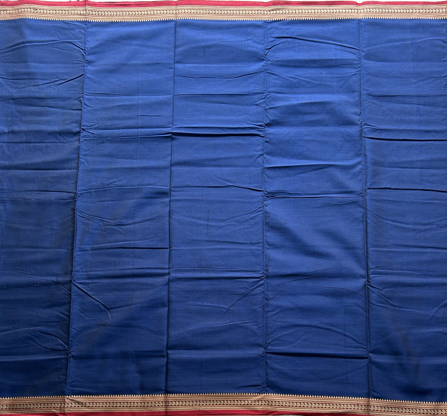 Narayanpet Cotton Saree Prussian Blue Colored Complemented with a Thread Border.