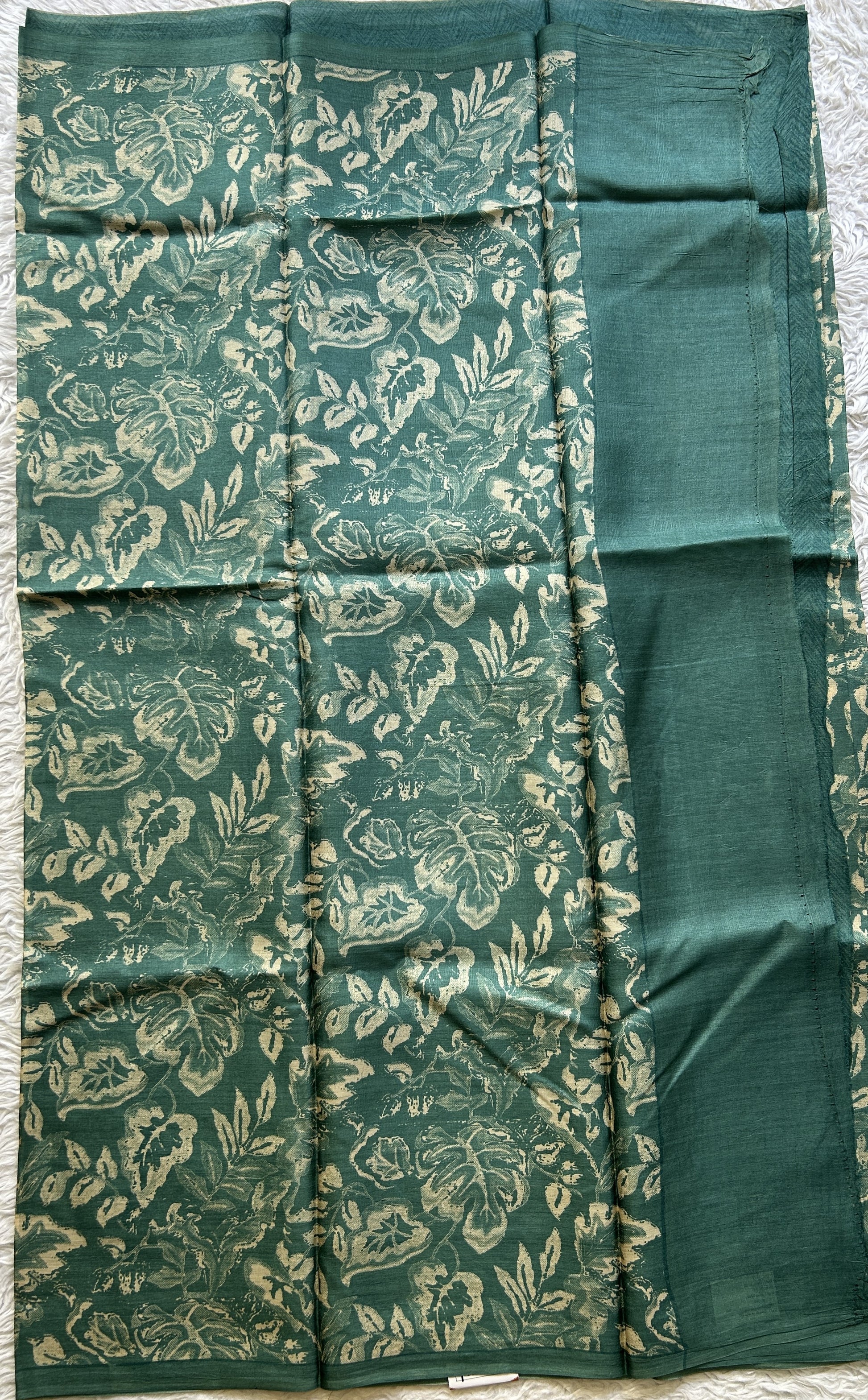 Pure Tussar Silk Saree Rama Green Color Complemented with a Borderless. - Sampradaya Designer Studio
