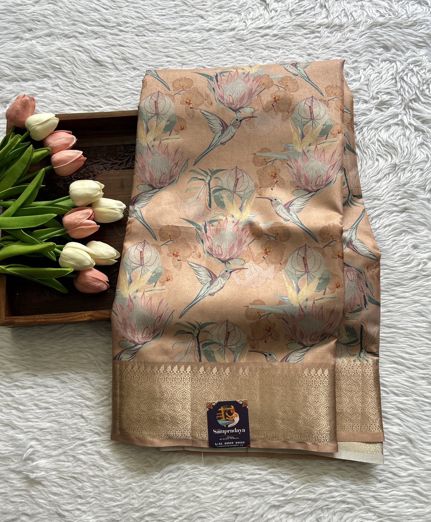 Banarasi Soft Silk Saree Light Orange Colored Complemented with a Zari Border. - Sampradaya Designer Studio