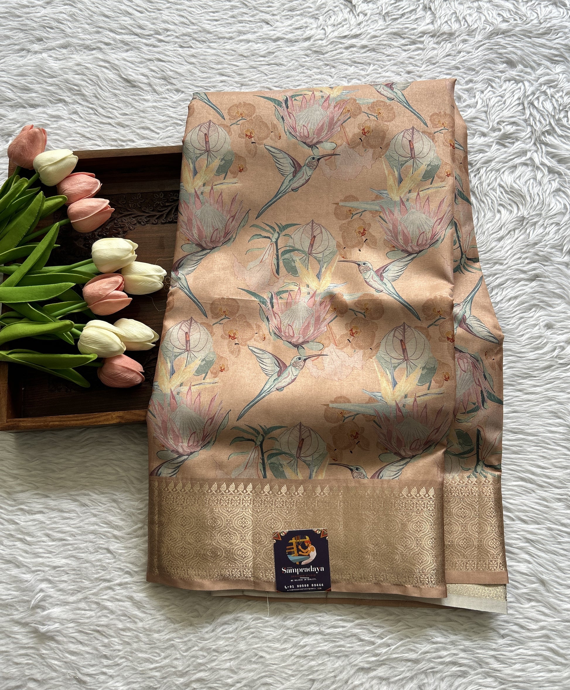 Banarasi Soft Silk Saree Light Orange Colored Complemented with a Zari Border. - Sampradaya Designer Studio