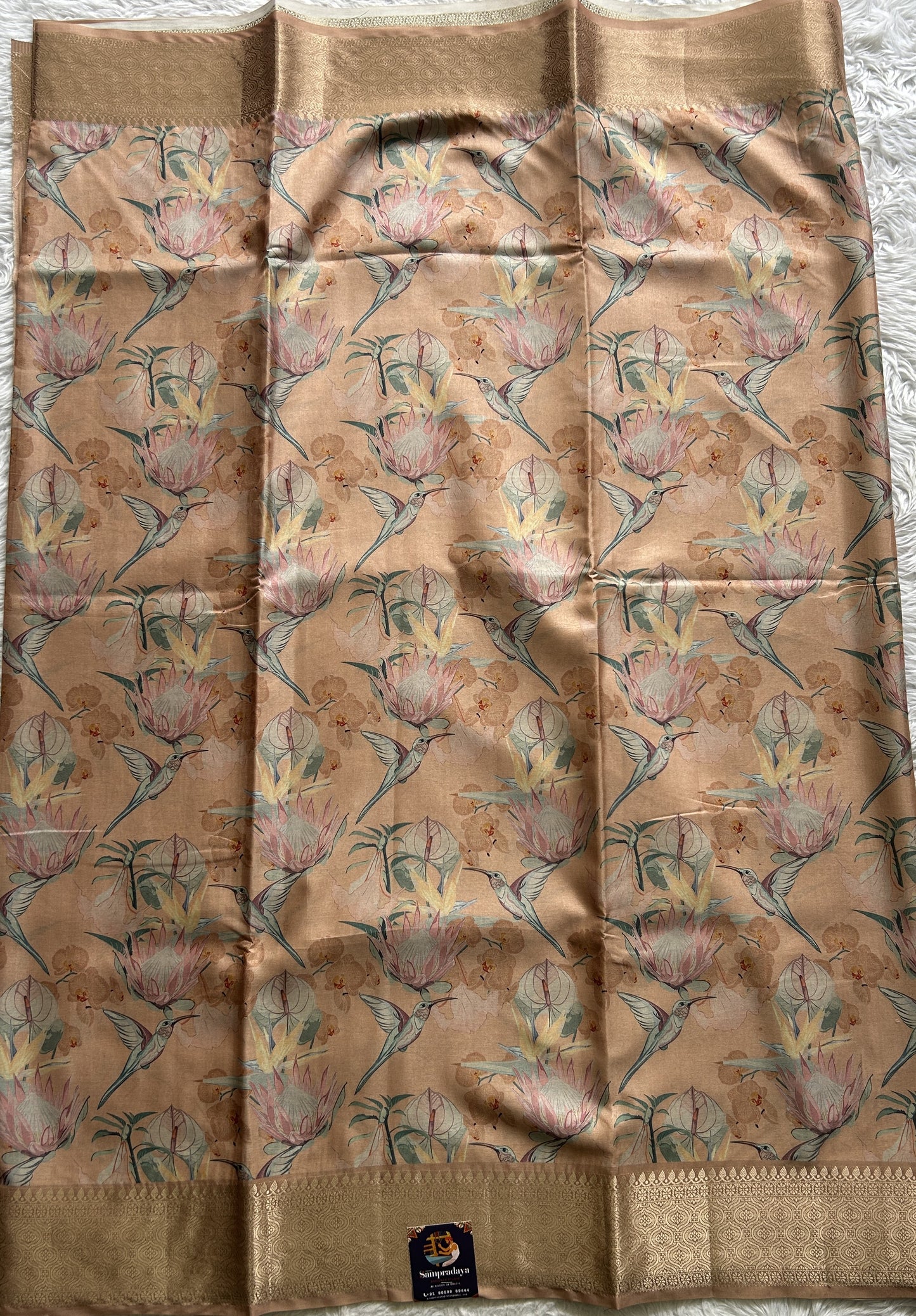 Banarasi Soft Silk Saree Light Orange Colored Complemented with a Zari Border. - Sampradaya Designer Studio