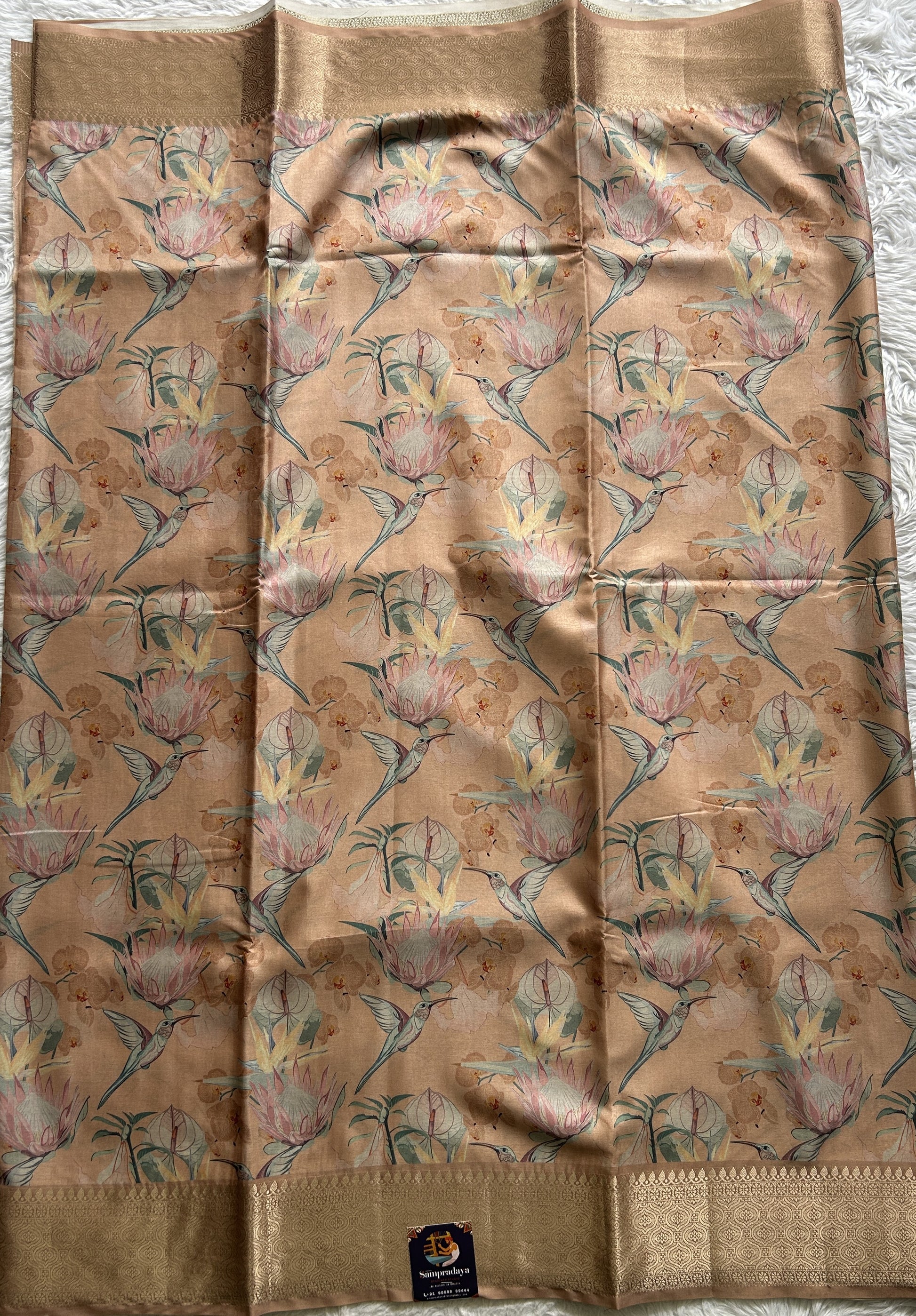 Banarasi Soft Silk Saree Light Orange Colored Complemented with a Zari Border. - Sampradaya Designer Studio