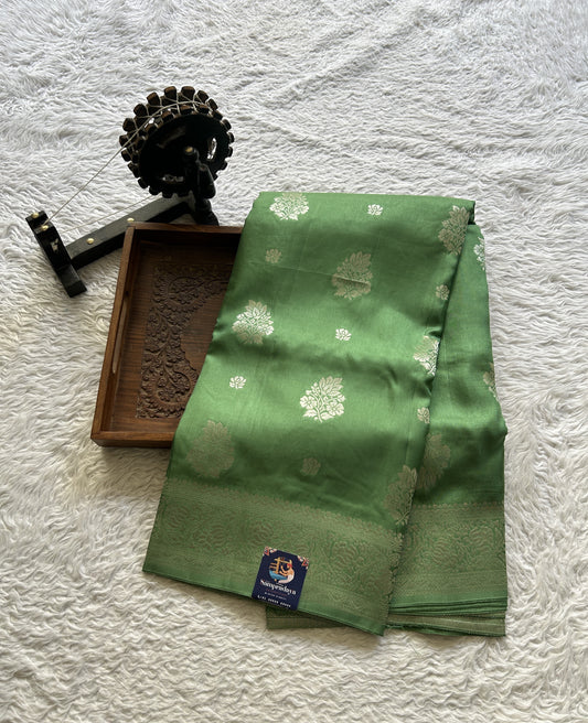 Semi Georgette Saree Emerald Colored Complemented with a Zari Border. - Sampradaya Designer Studio