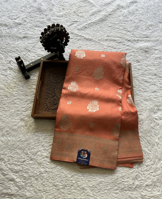 Semi Georgette Saree Coral Colored Complemented with a Zari Border. - Sampradaya Designer Studio