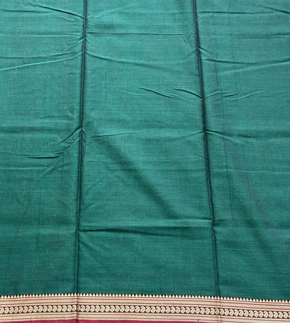 Narayanpet Cotton Saree Forest Green Colored Complemented with a Thread Border.