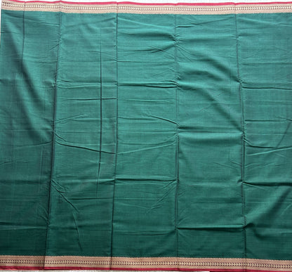 Narayanpet Cotton Saree Forest Green Colored Complemented with a Thread Border.