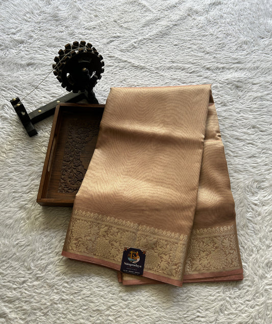 Tissue Organza Saree Light Peach Colored Complemented with a Zari Border. - Sampradaya Designer Studio