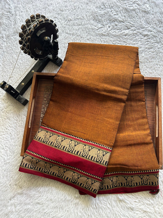 Narayanpet Cotton Saree Sepia Brown Colored  Complemented with a Thread Border.