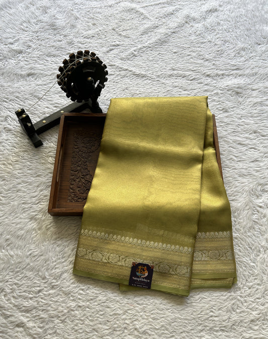 Tissue Organza Saree Light Pista Green Colored Complemented with a Zari Border. - Sampradaya Designer Studio