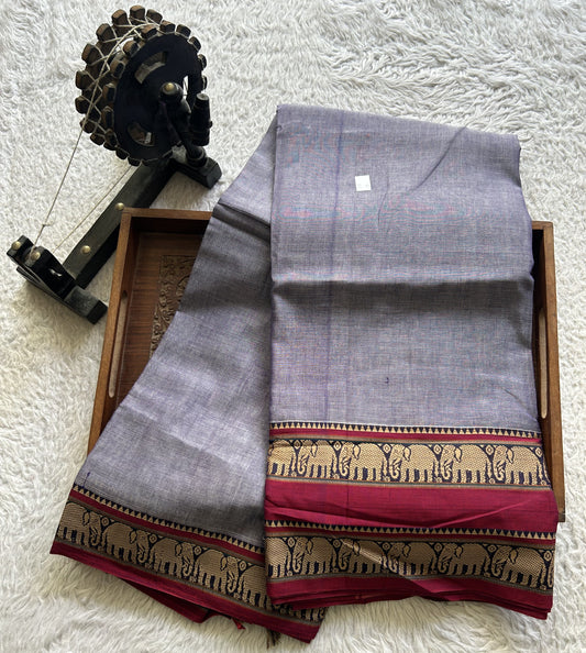 Narayanpet Cotton Saree Light Lavender Colored Complemented with a Thread Border.