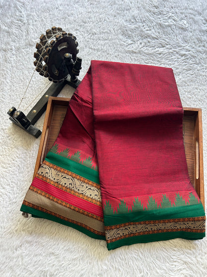 Narayanpet Cotton Saree Sangria  Maroon Colored Complemented with a Thread Border.