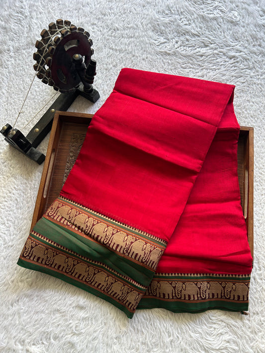 Narayanpet Cotton Saree Carmine Red Colored  Complemented with a Thread Border.