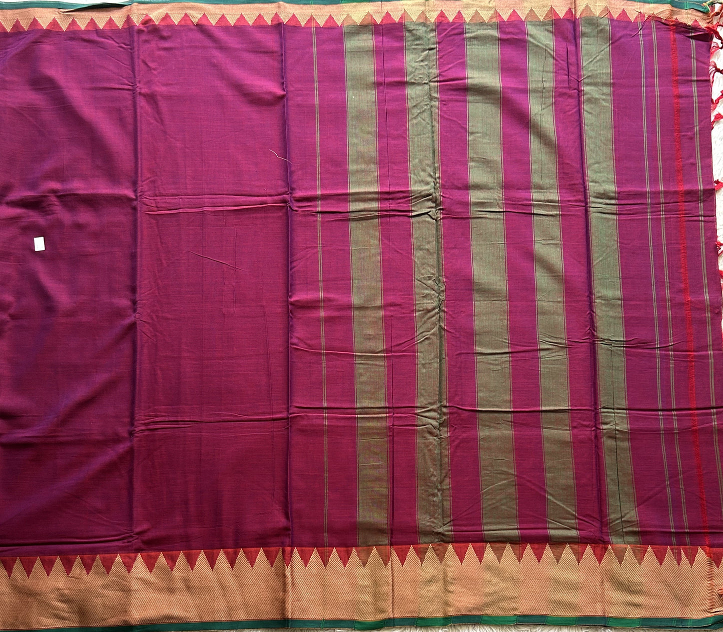 Narayanpet Cotton Saree Light Plum Colored  Complemented with a Thread Border.