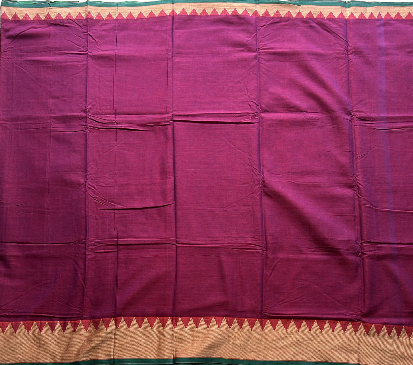 Narayanpet Cotton Saree Light Plum Colored  Complemented with a Thread Border.
