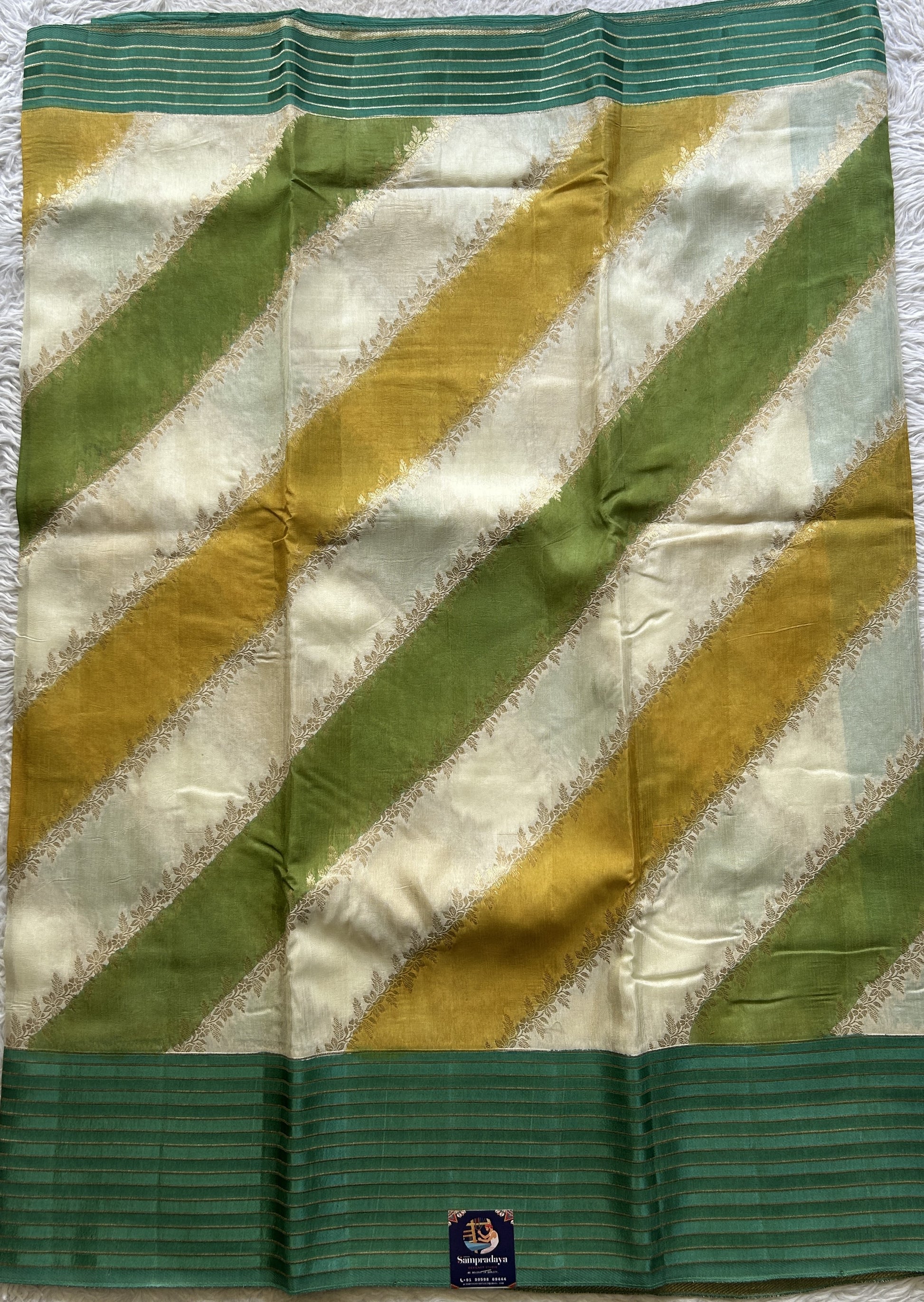 Semi Georgette Leheriya Saree Sea Green Colored Complemented with a Zari Border. - Sampradaya Designer Studio