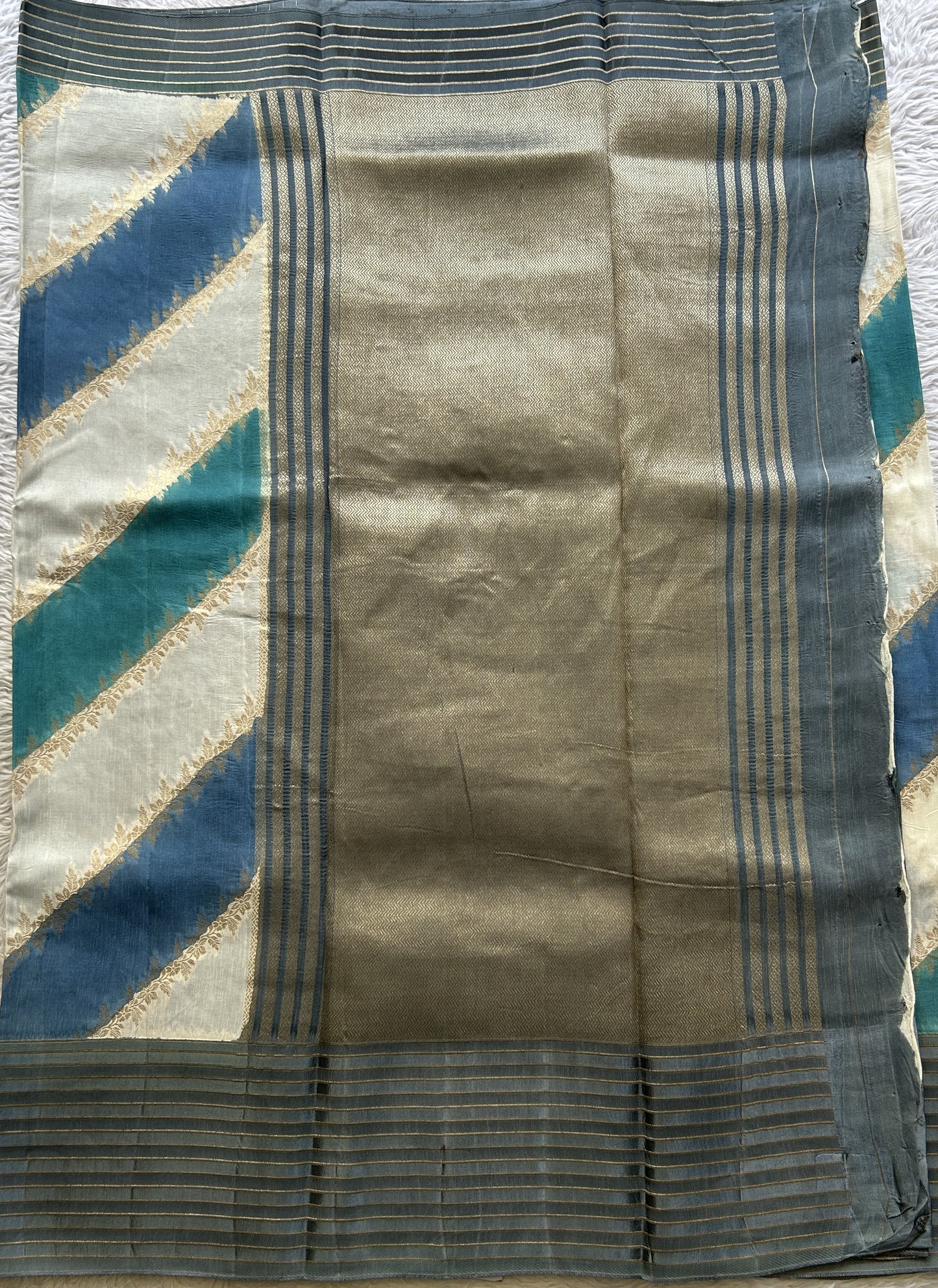 Semi Georgette Leheriya Saree Teal Blue Colored Complemented with a Zari Border. - Sampradaya Designer Studio