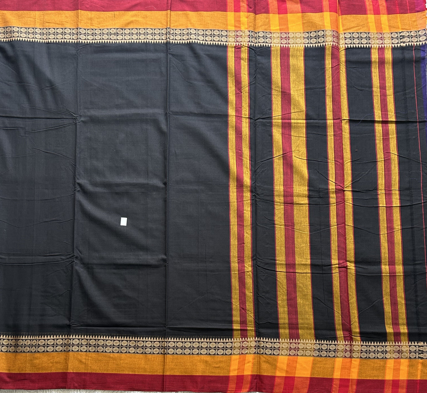 Narayanpet Cotton Saree Midnight Black Colored  Complemented with a Thread Border.