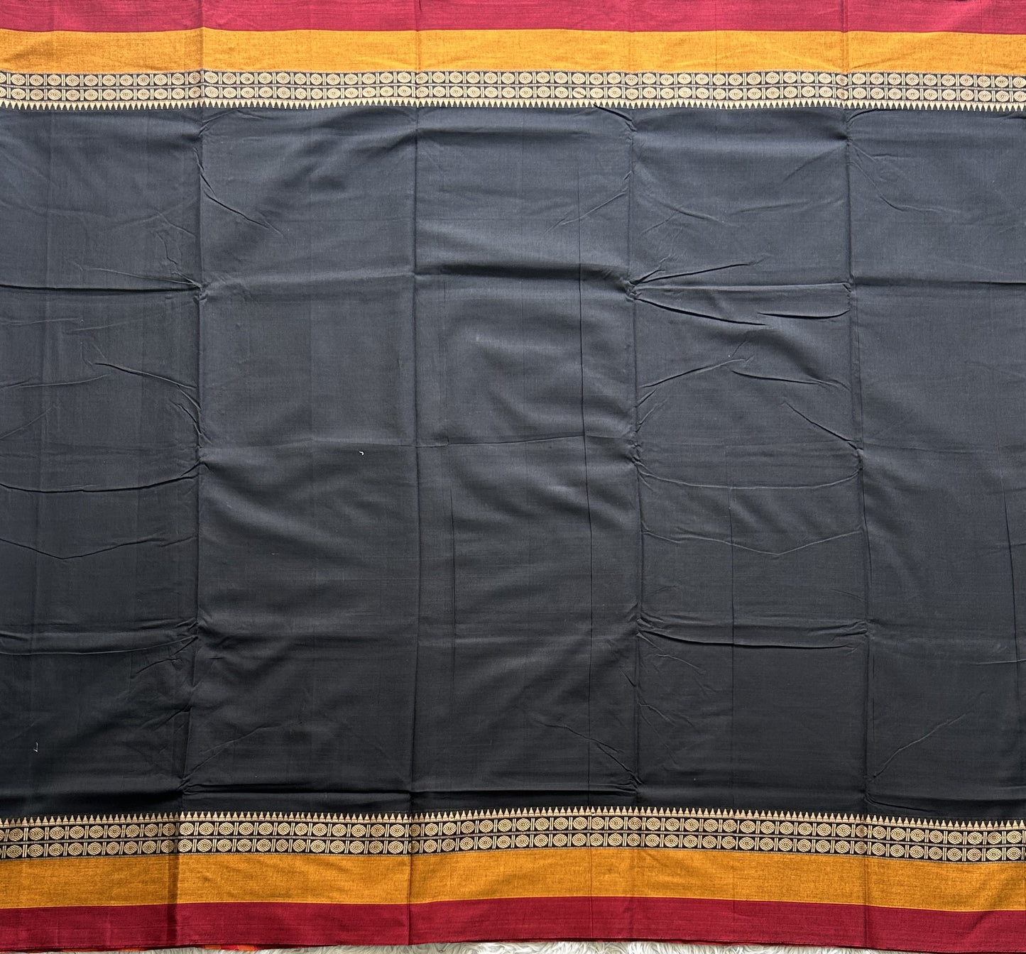 Narayanpet Cotton Saree Midnight Black Colored  Complemented with a Thread Border.
