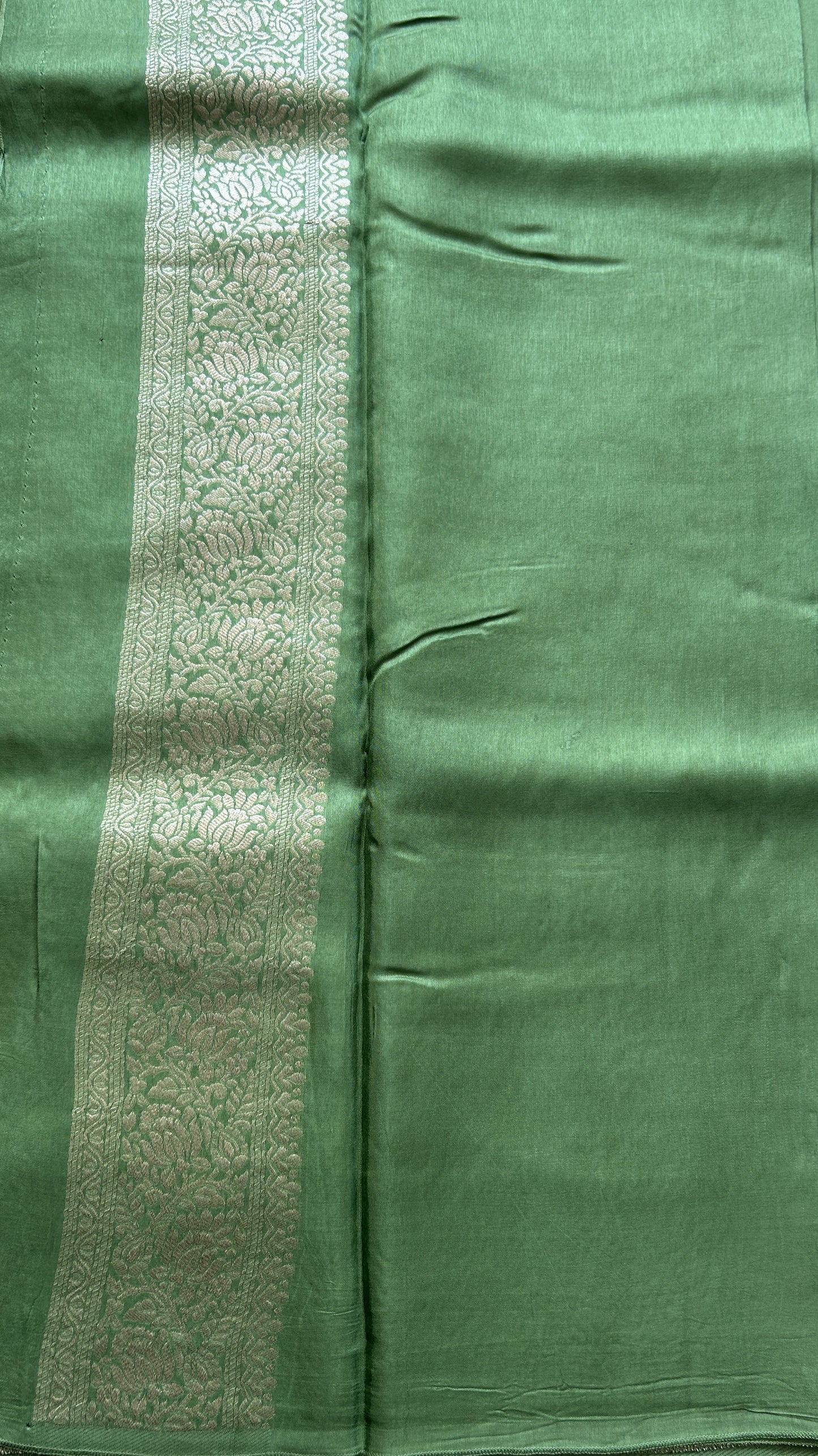 Semi Georgette Saree Emerald Colored Complemented with a Zari Border. - Sampradaya Designer Studio