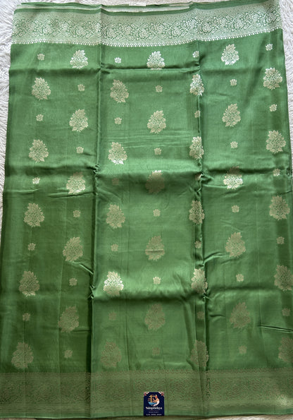 Semi Georgette Saree Emerald Colored Complemented with a Zari Border. - Sampradaya Designer Studio