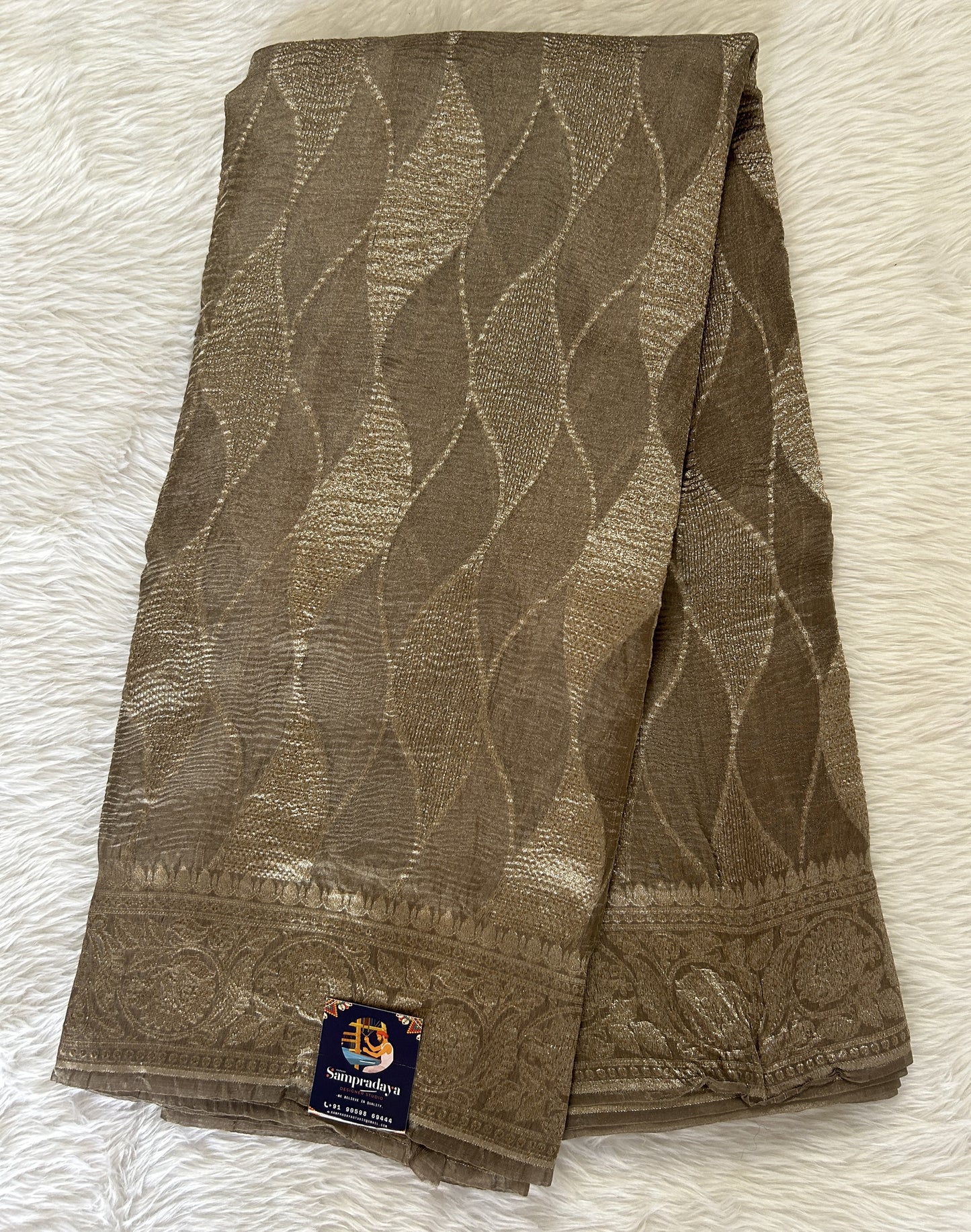 Banarasi Crushed Silk Saree Brownish Gray colored Saree complemented with a Silver Zari border. - Sampradaya Designer Studio