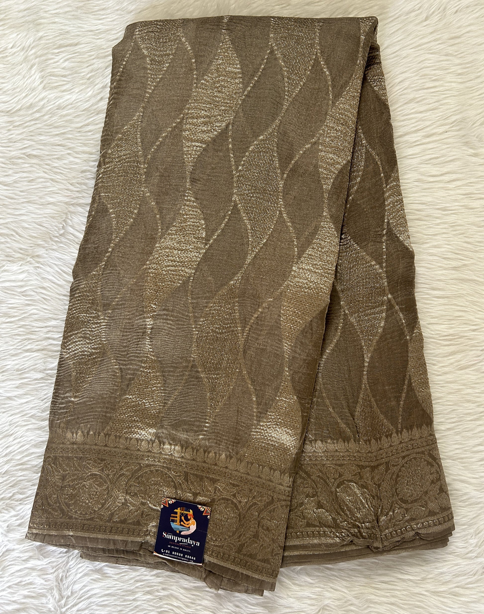 Banarasi Crushed Silk Saree Brownish Gray colored Saree complemented with a Silver Zari border. - Sampradaya Designer Studio