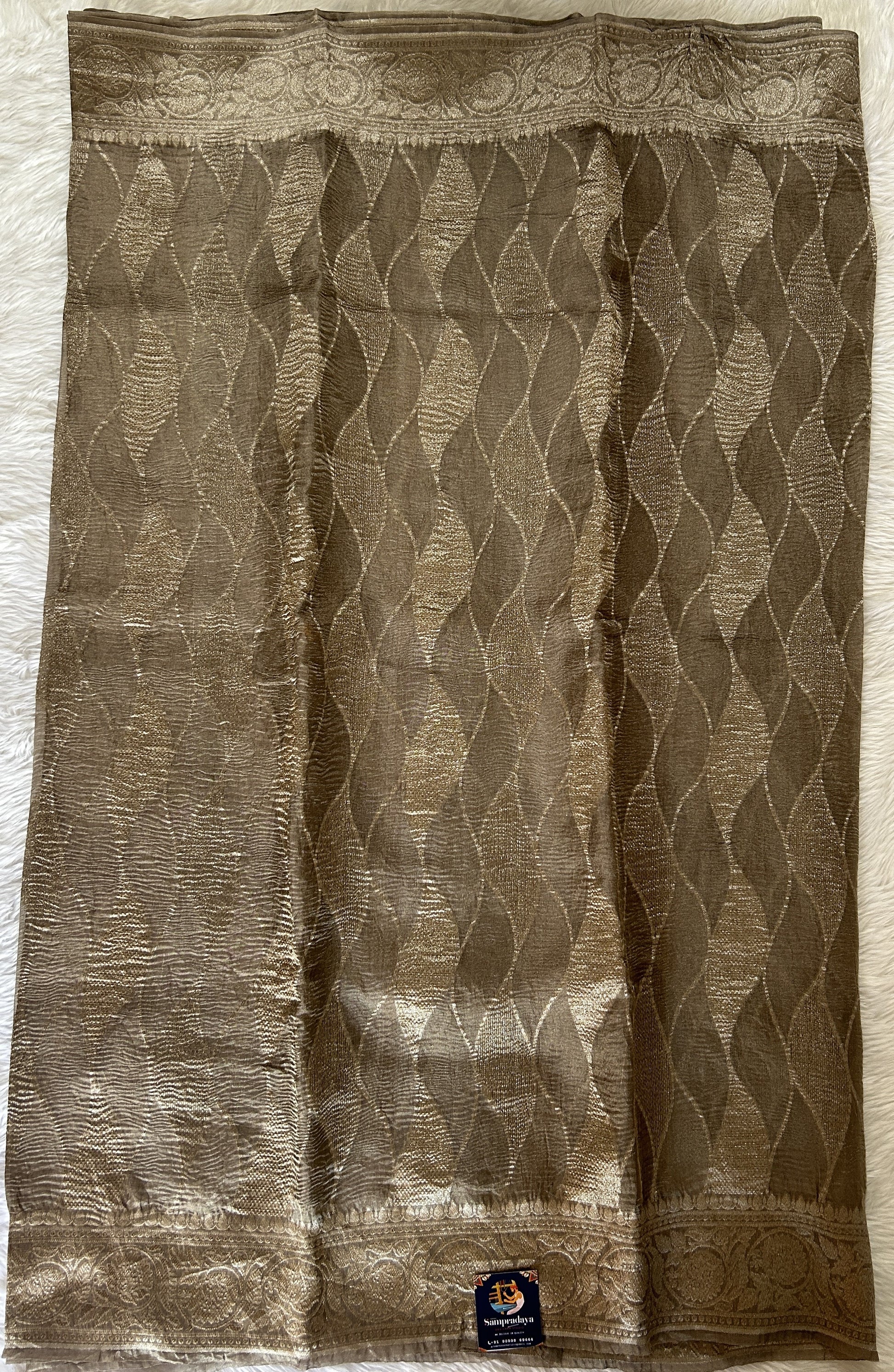 Banarasi Crushed Silk Saree Brownish Gray colored Saree complemented with a Silver Zari border. - Sampradaya Designer Studio