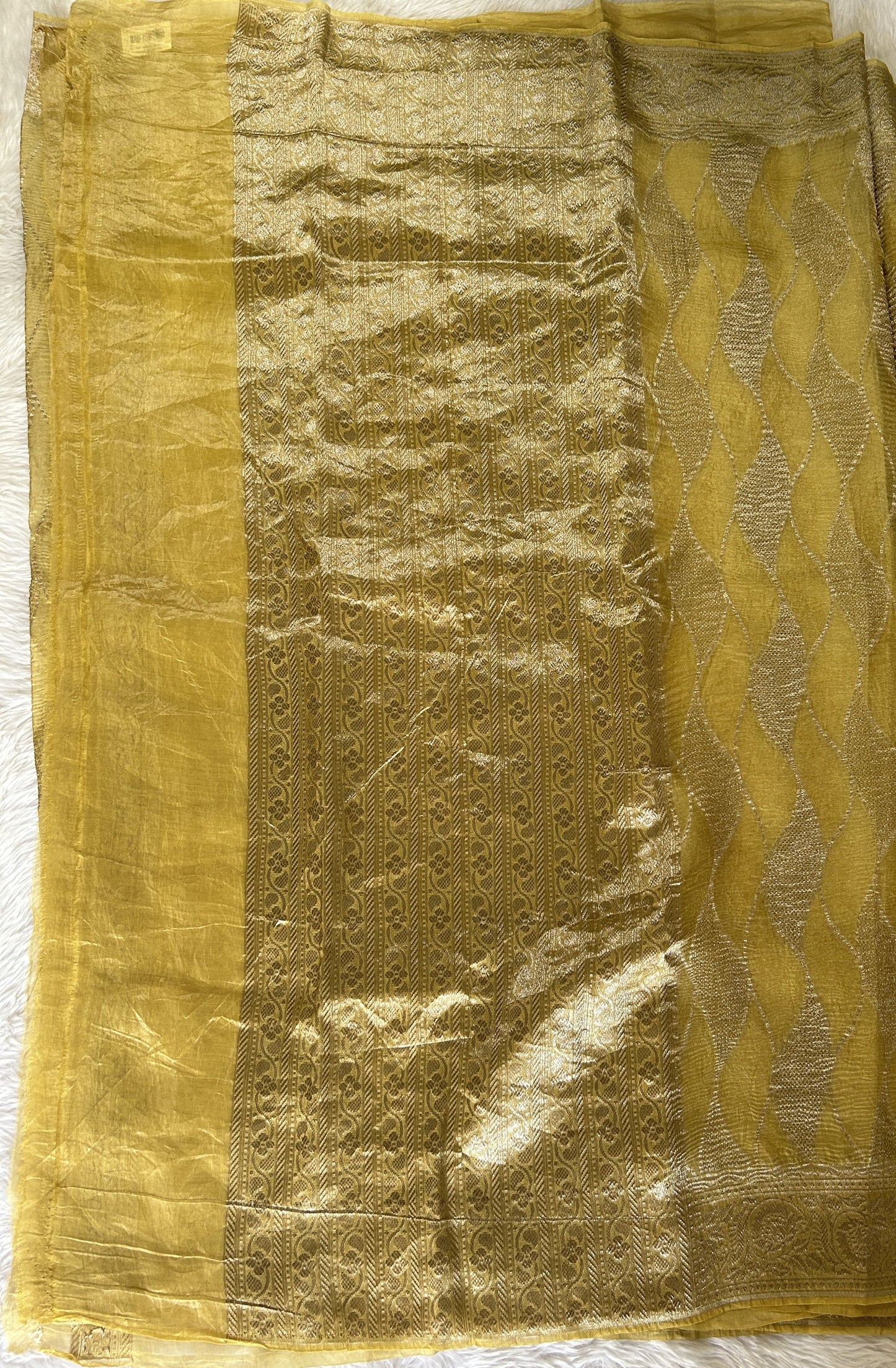 Banarasi Crushed Silk Saree Pastel Yellow colored Saree complemented with a Zari border. - Sampradaya Designer Studio