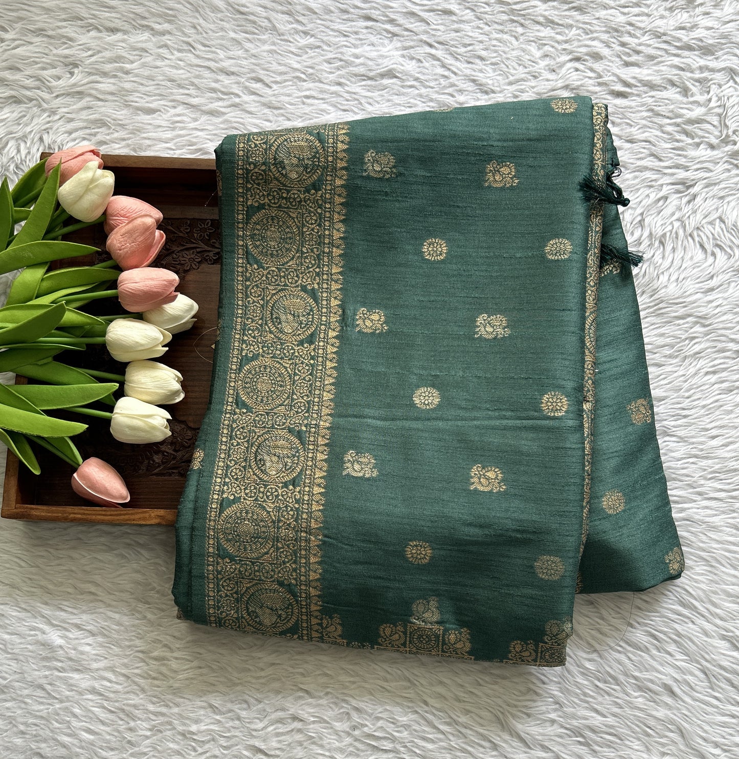 Semi Tussar Saree Bottle Green Colored complemented with a Zari Border. - Sampradaya Designer Studio
