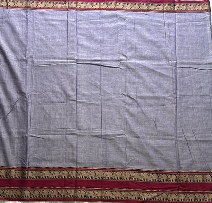 Narayanpet Cotton Saree Light Lavender Colored Complemented with a Thread Border.