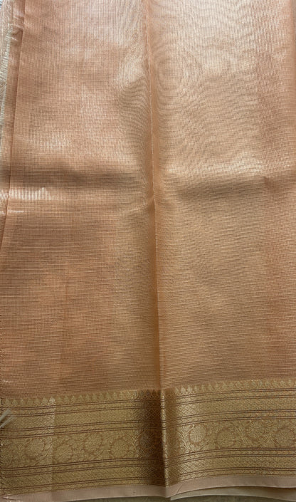 Silk kota Saree Apricot colored Elegantly Paired with a Zari Border. - Sampradaya Designer Studio