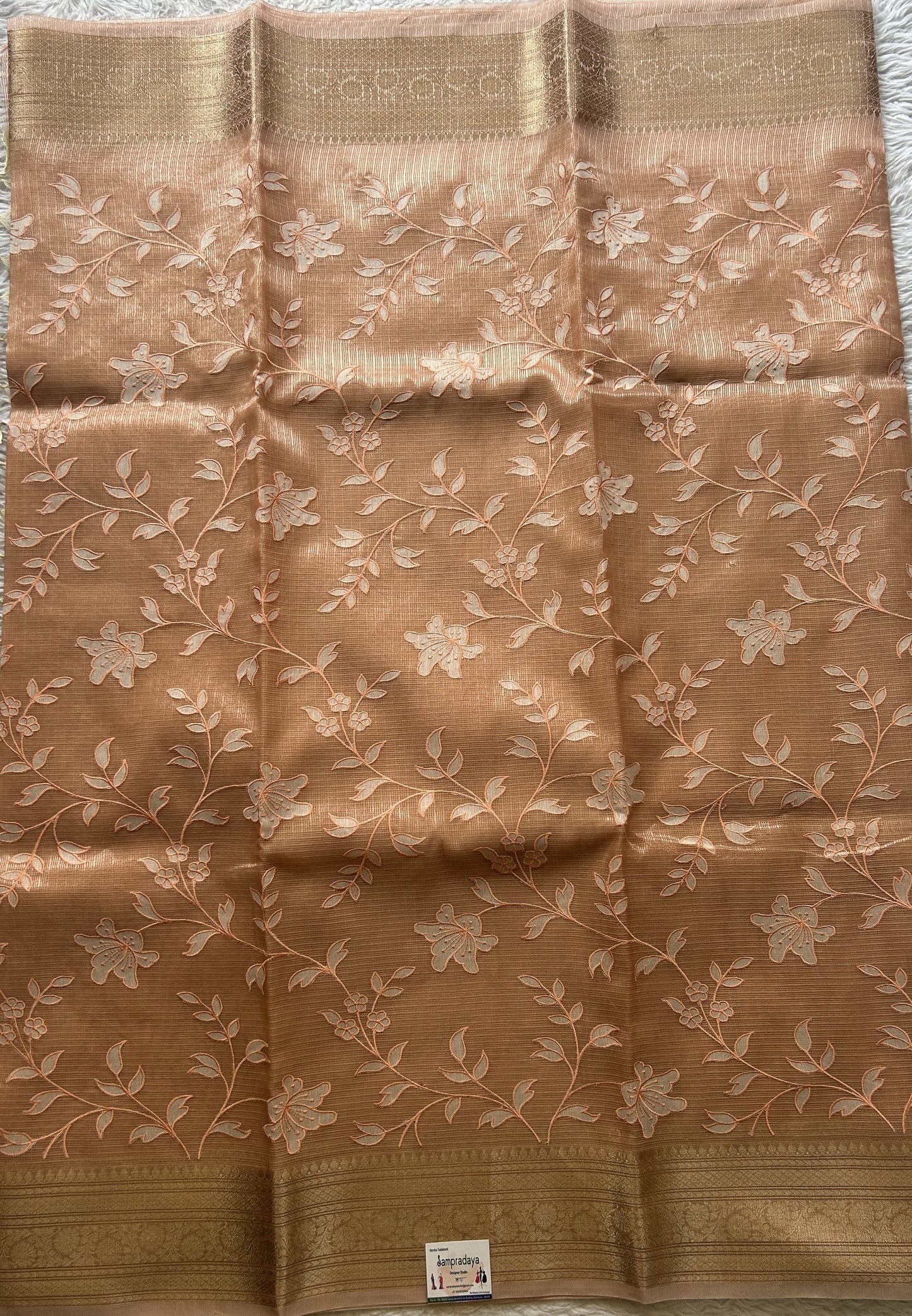 Silk kota Saree Apricot colored Elegantly Paired with a Zari Border. - Sampradaya Designer Studio