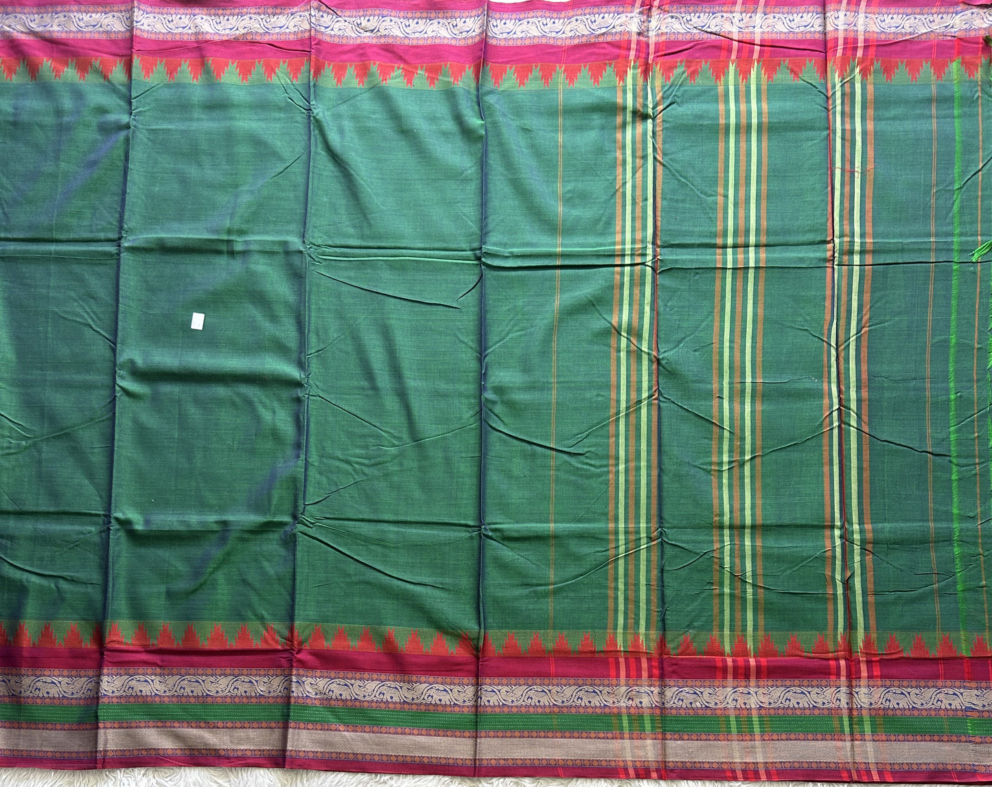 Narayanpet Cotton Saree Light Basil Green Colored Complemented with a Thread Border.