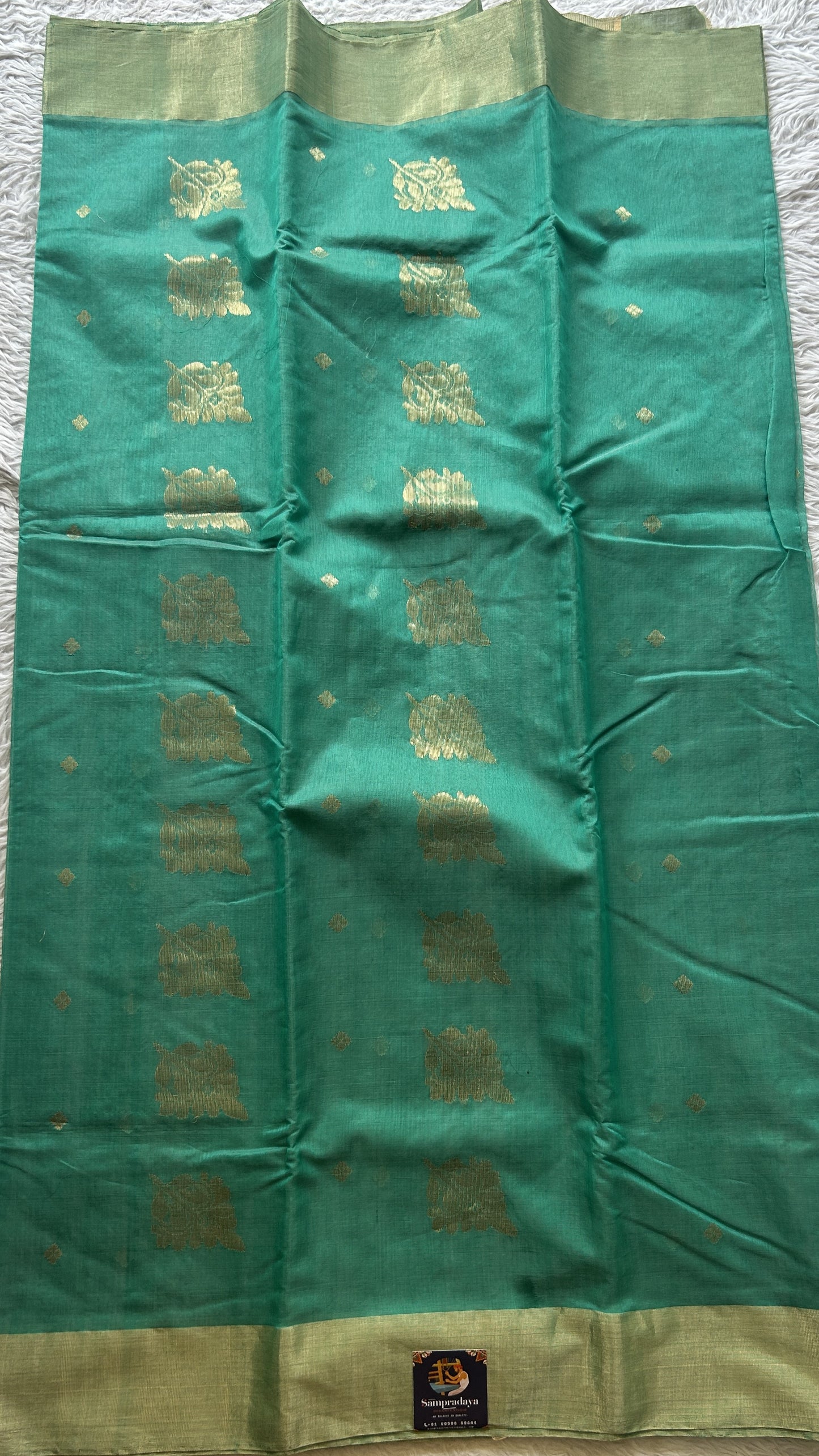 Chanderi Sico Saree Greenish Turquoise Colored Complemented with a Zari Border. - Sampradaya Designer Studio
