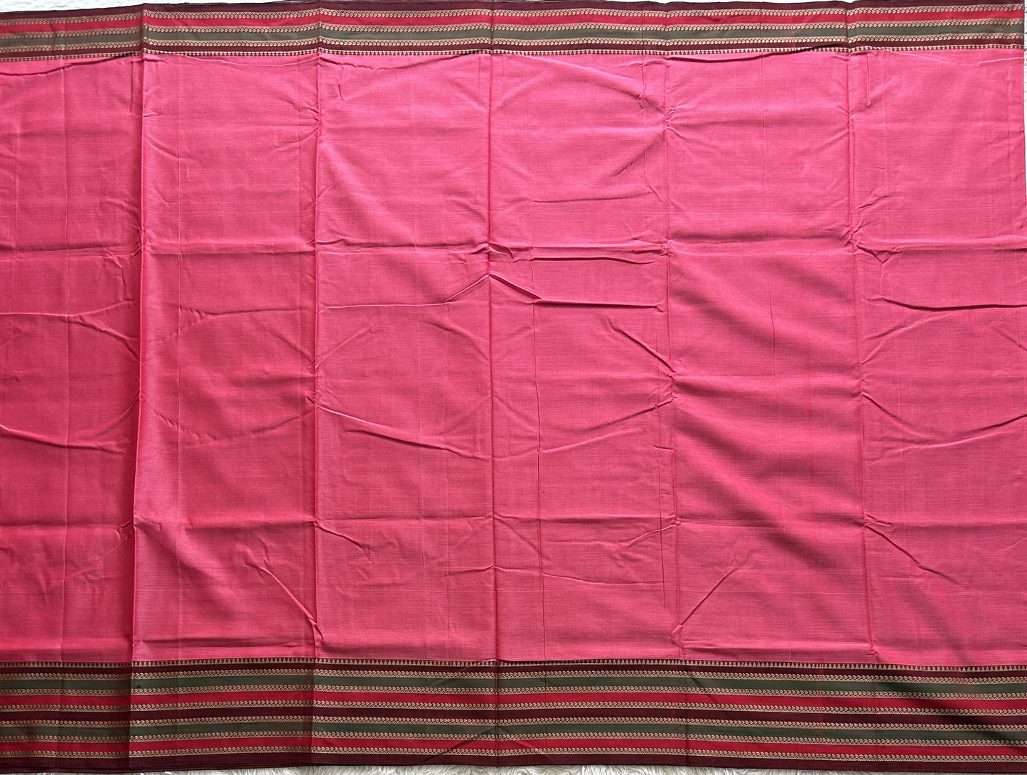 Narayanpet Cotton Saree Punch Pink Colored  Complemented with a Thread Border.