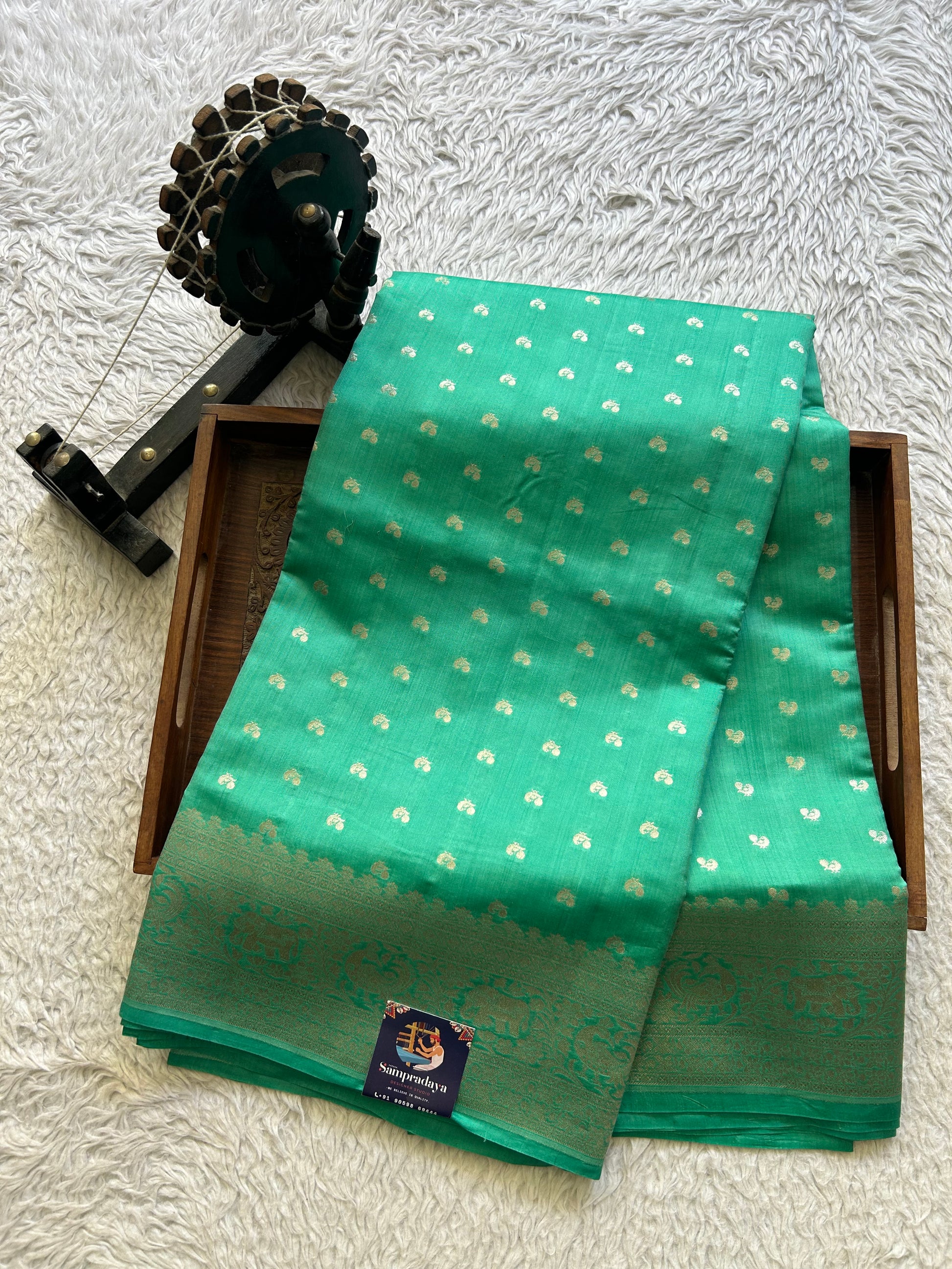 Pure Chiniya Silk Saree Jungle Colored Elegantly Paired with a Silver Zari Border. - Sampradaya Designer Studio