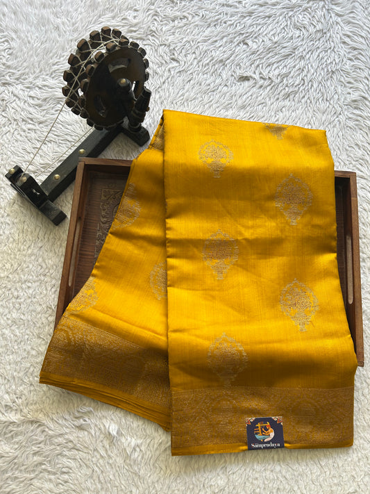 Pure Chiniya Silk Saree Dark Mustard Colored Elegantly Paired with a Gold Zari Border.