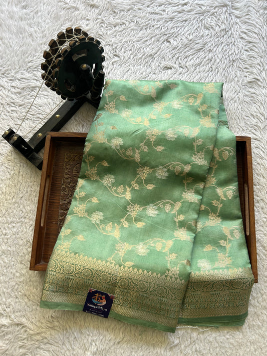 Pure Chiniya Silk Saree Mint Green Colored Elegantly Paired with a Gold Zari Border.