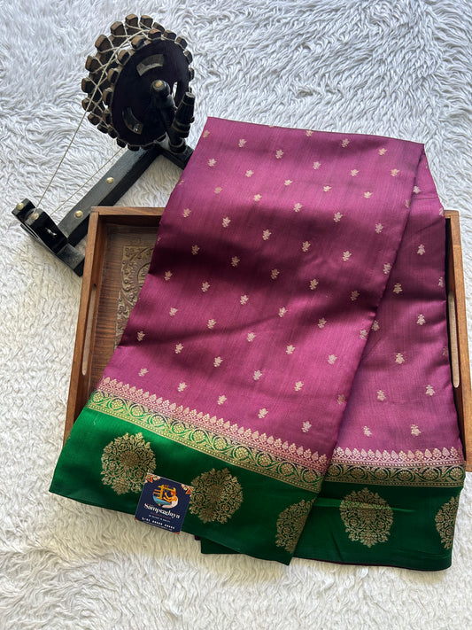Pure Chiniya Silk Saree Wain Colored Elegantly Paired with a Gold Zari Border.