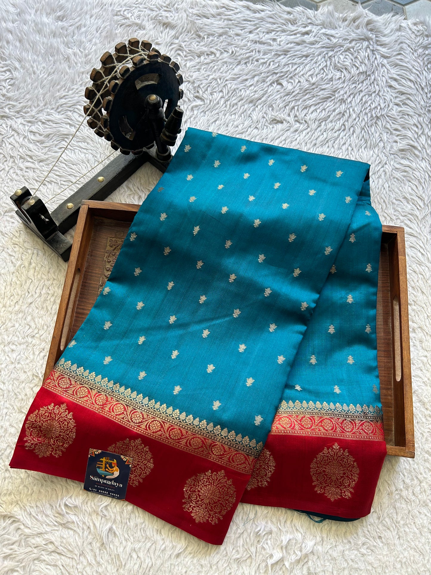 Pure Chiniya Silk Saree Dark Teel Blue Colored Elegantly Paired with a Gold Zari Border. - Sampradaya Designer Studio