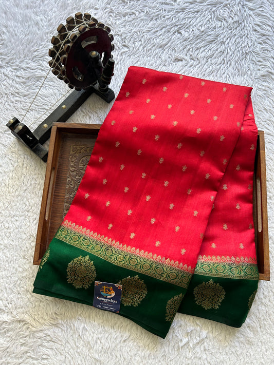 Pure Chiniya Silk Saree Dark Red Colored Elegantly Paired with a Gold Zari Border.